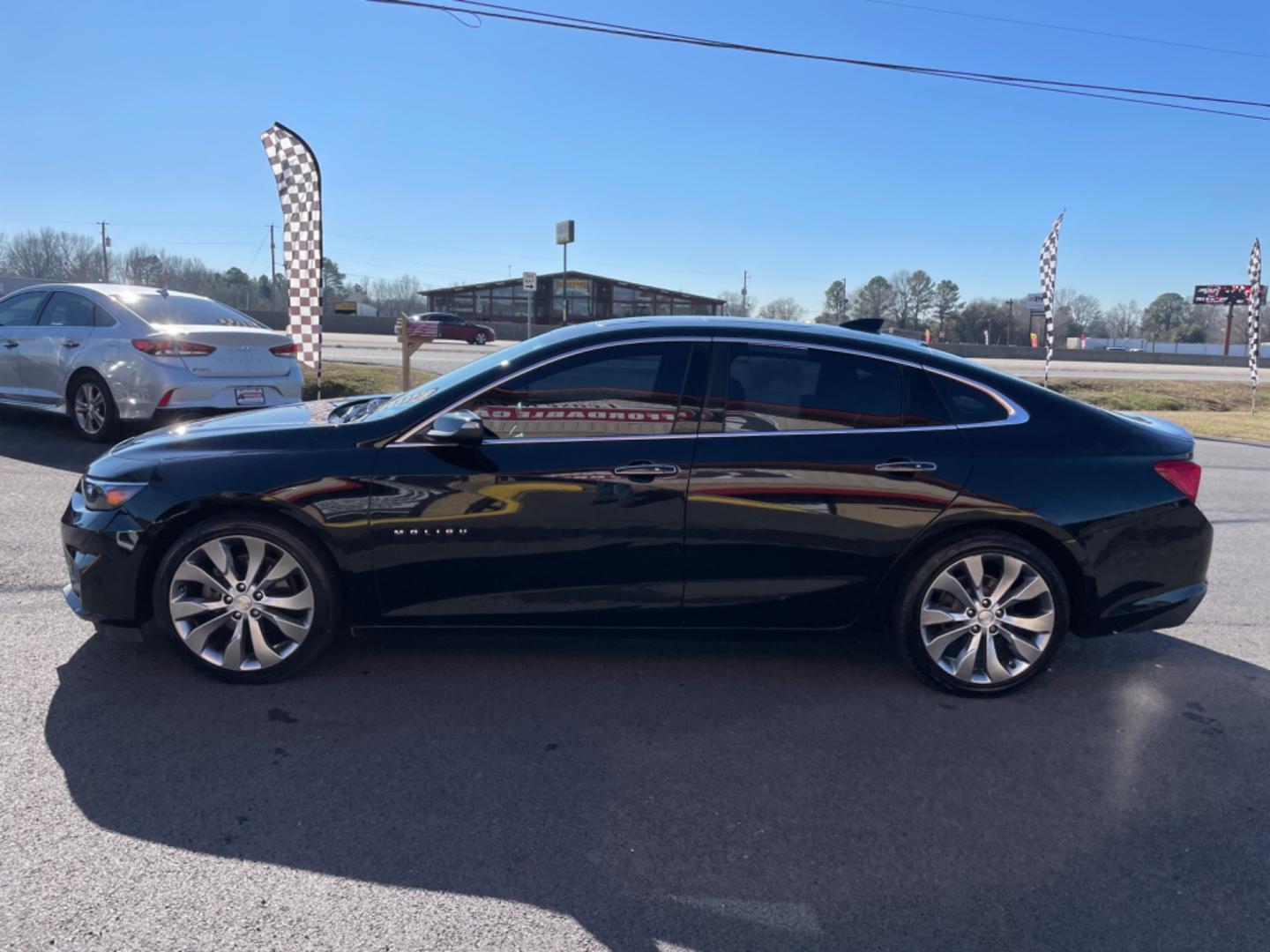 2017 Black Chevrolet Malibu (1G1ZH5SX0HF) with an 4-Cyl, Turbo, 2.0 Liter engine, Automatic, 9-Spd transmission, located at 8008 Warden Rd, Sherwood, AR, 72120, (501) 801-6100, 34.830078, -92.186684 - Photo#4